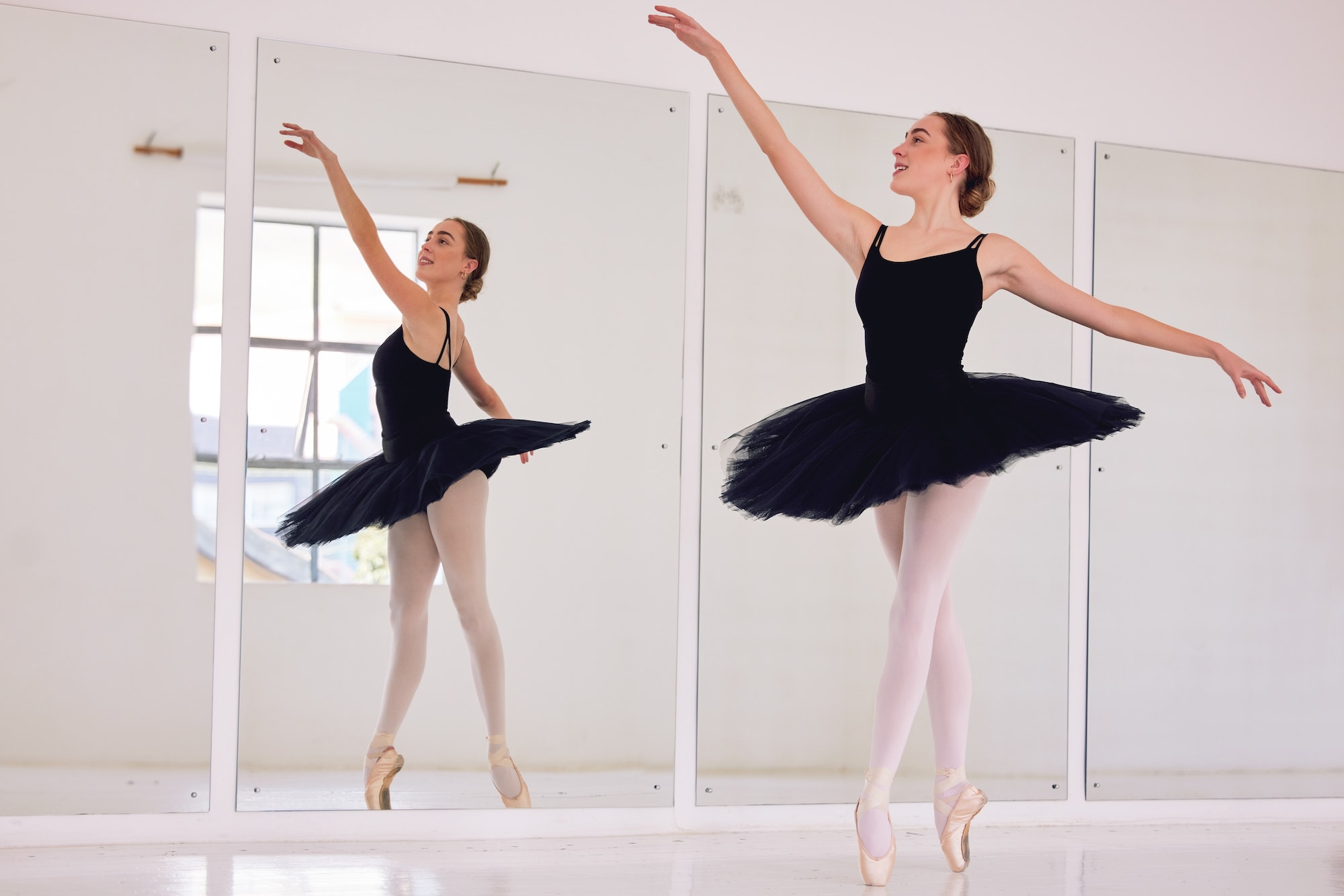 Ballet dancer or ballerina in dance studio practice or training for dancing performance or competit