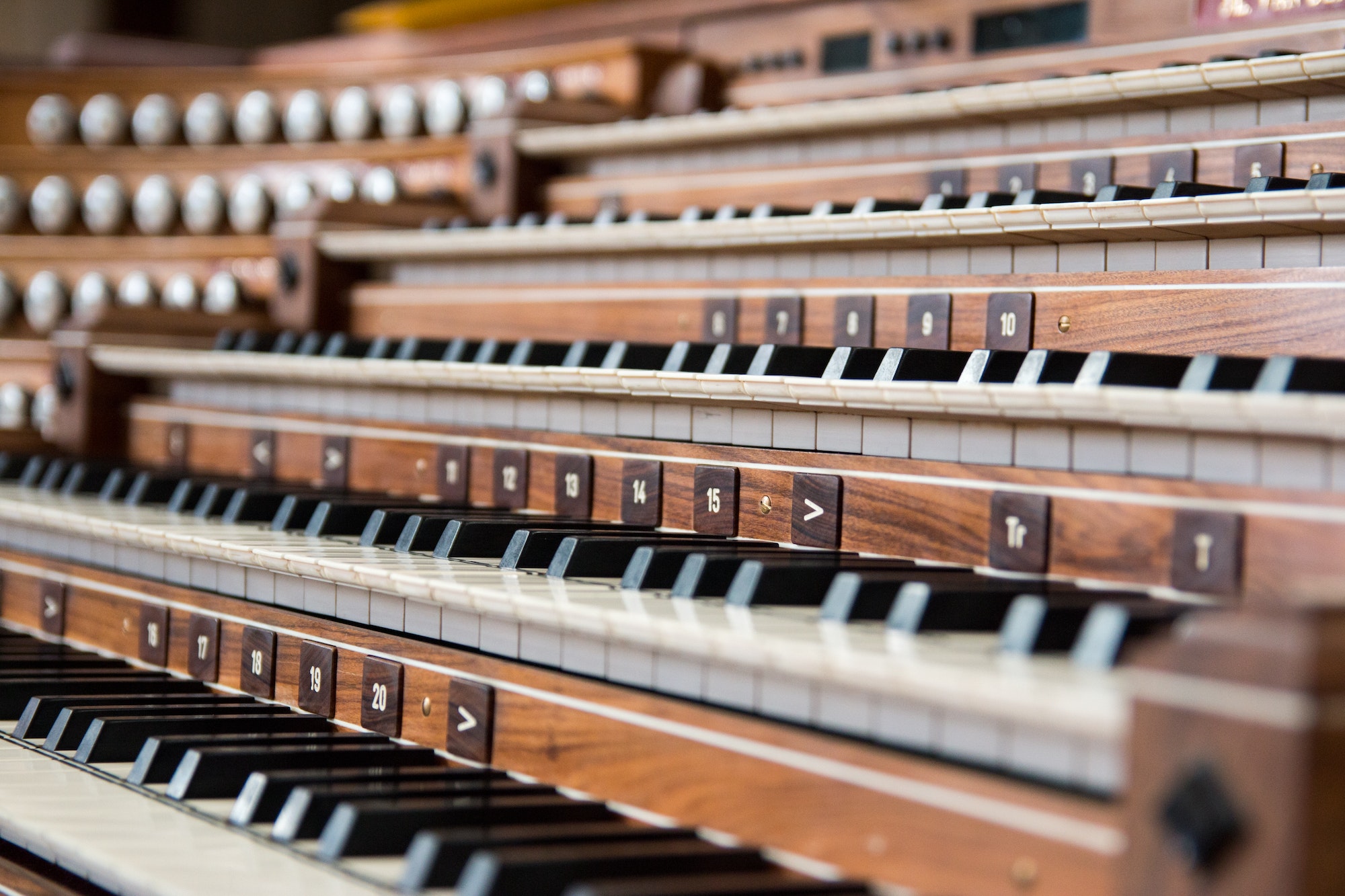 Close up of the keys of an organ in a church