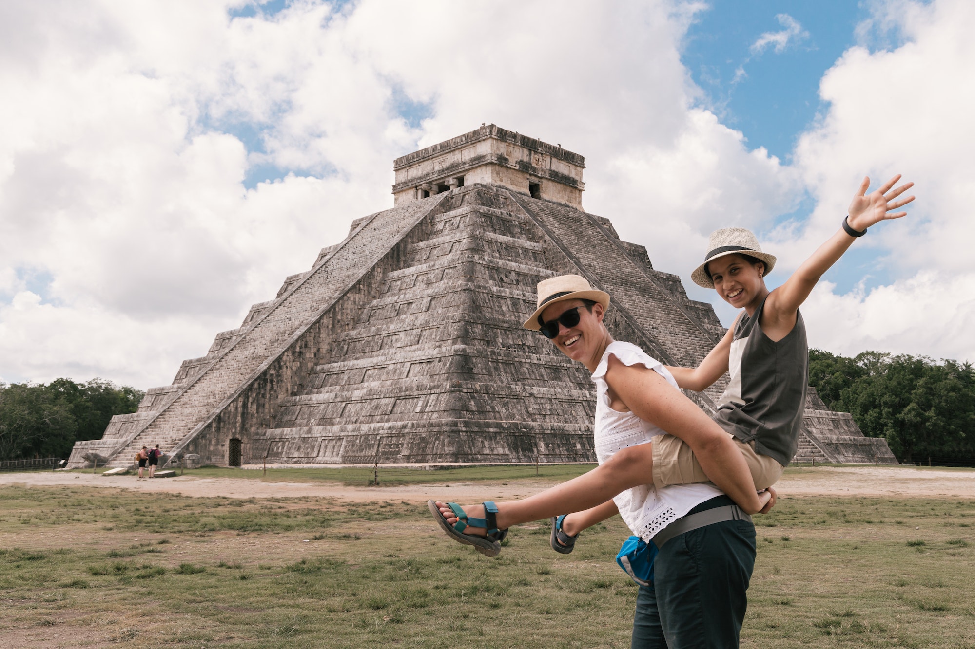 Family vacations, mother and daughter together, pyramid in Chichen Itza, Yucatan, Mexico