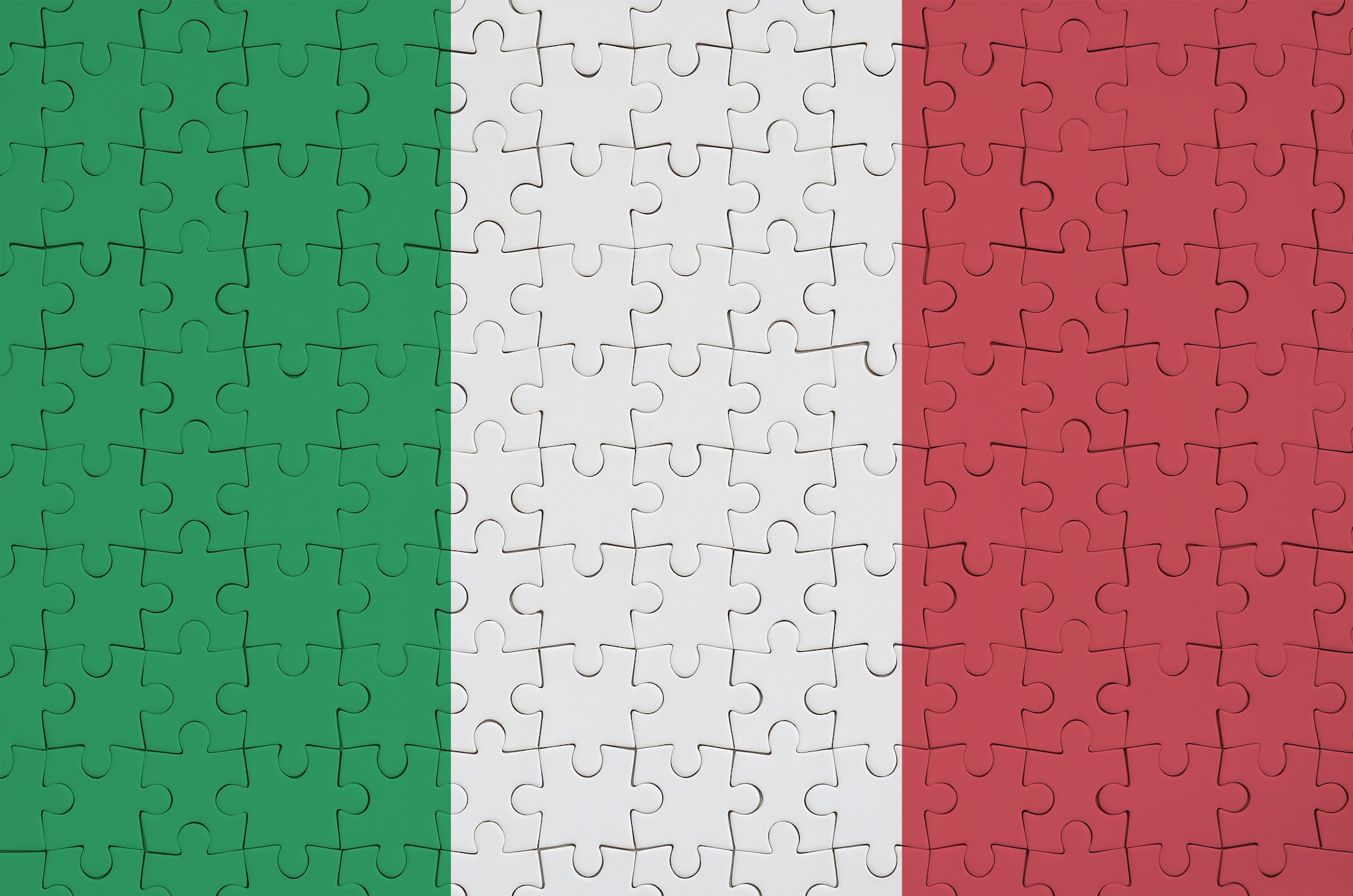 Italy flag is depicted on a folded puzzle
