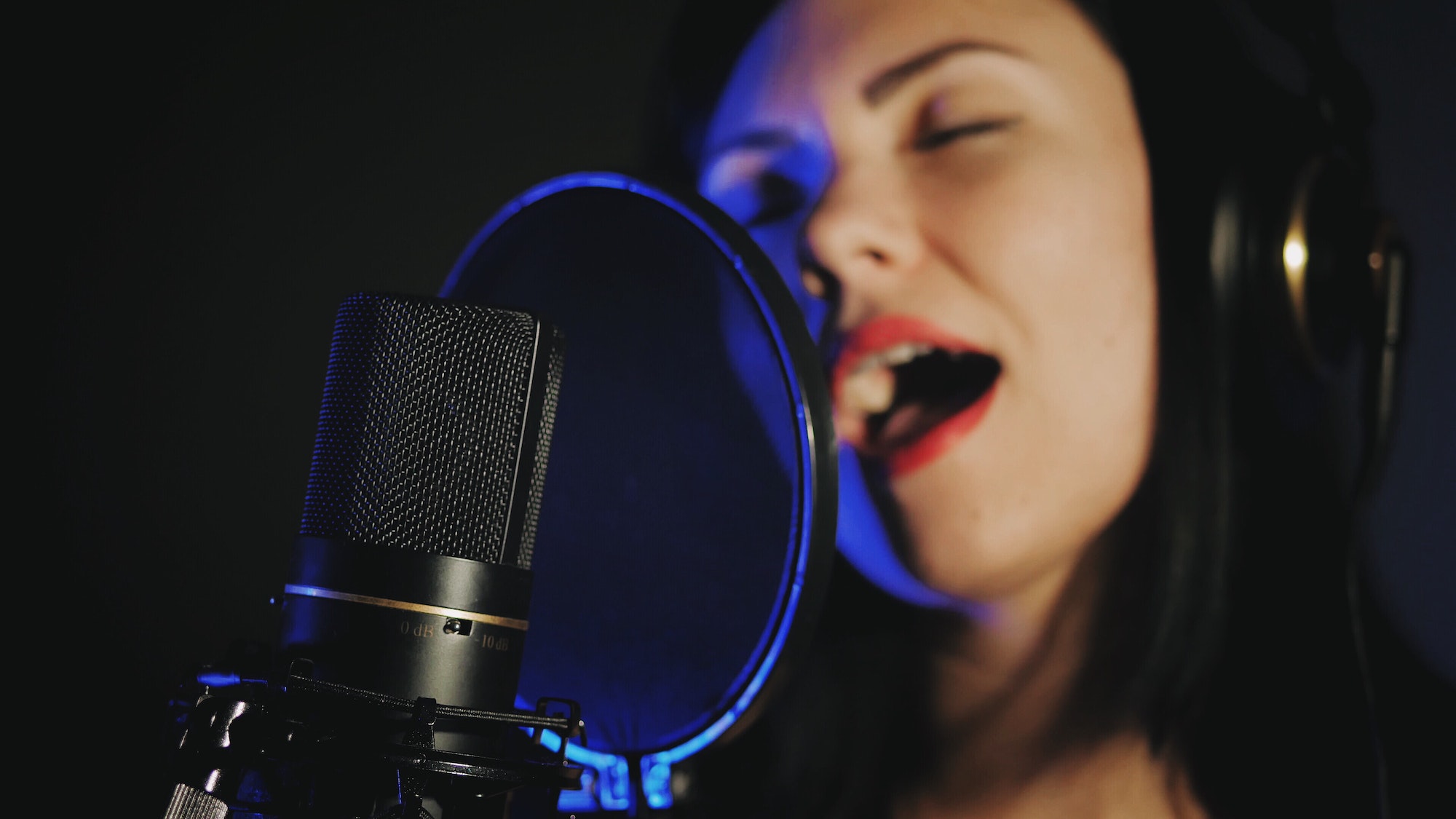 Singer woman in recording studio
