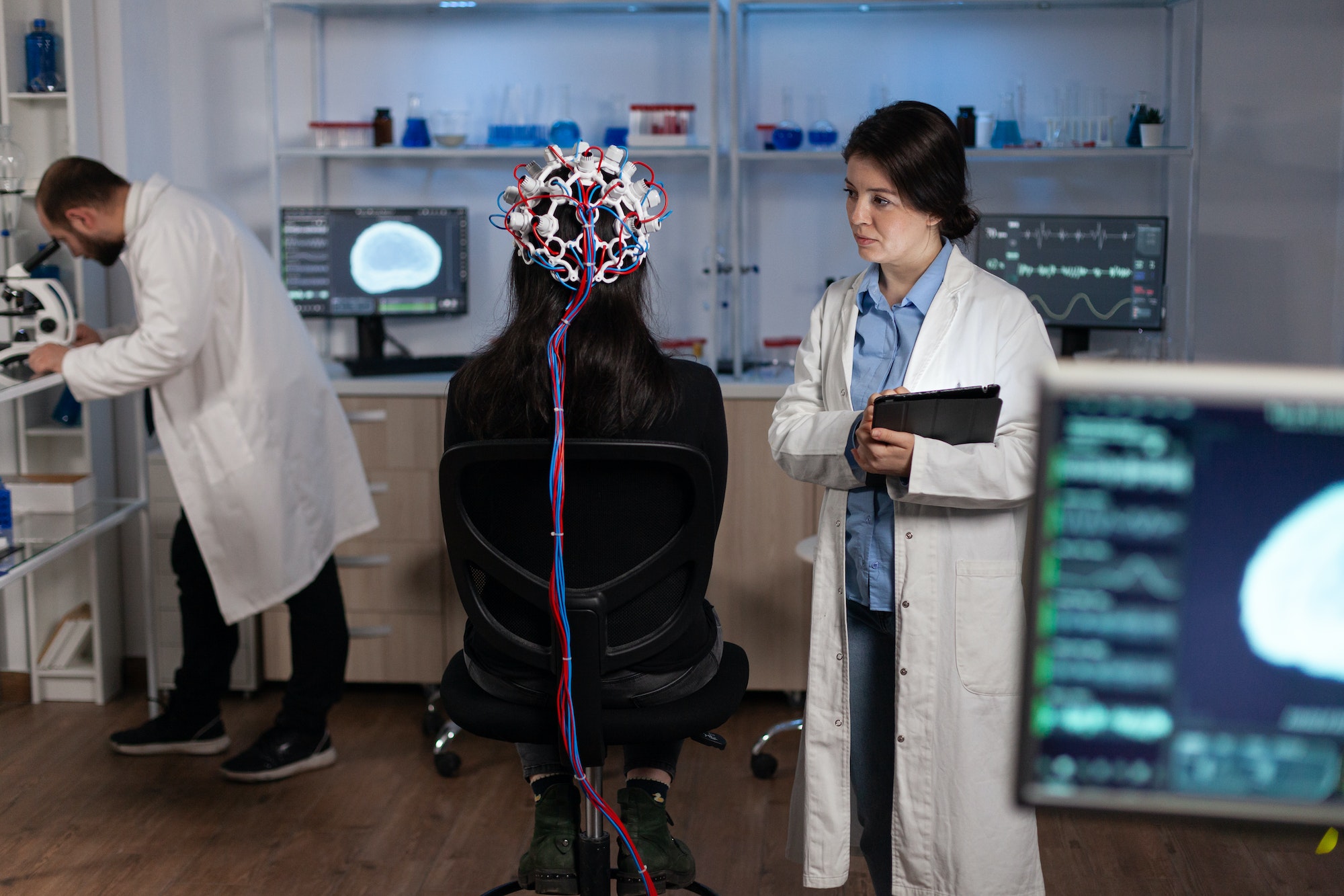 Specialist researcher doctor monitoring brain activity evolution