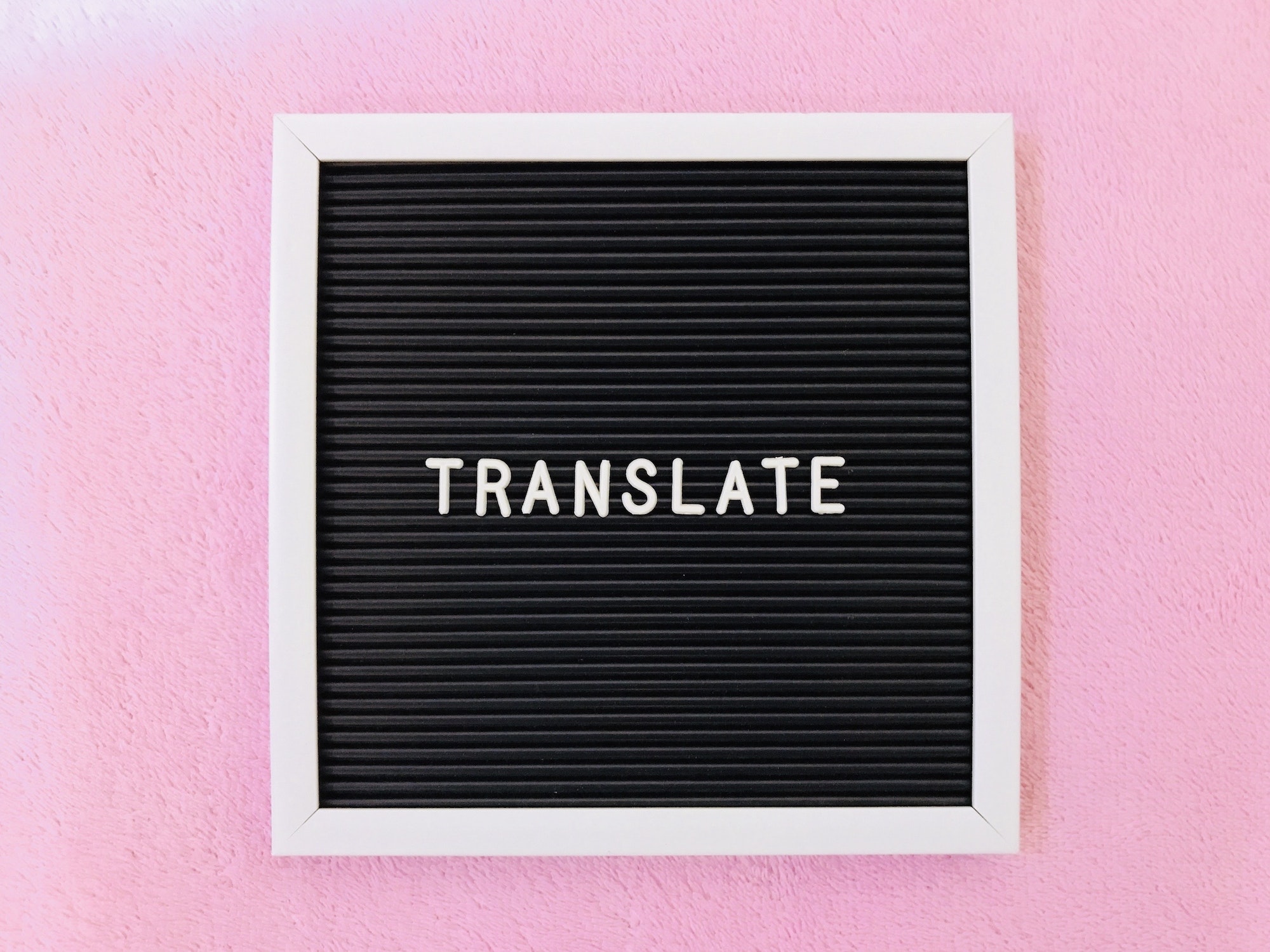 Translate wording on pink background 113